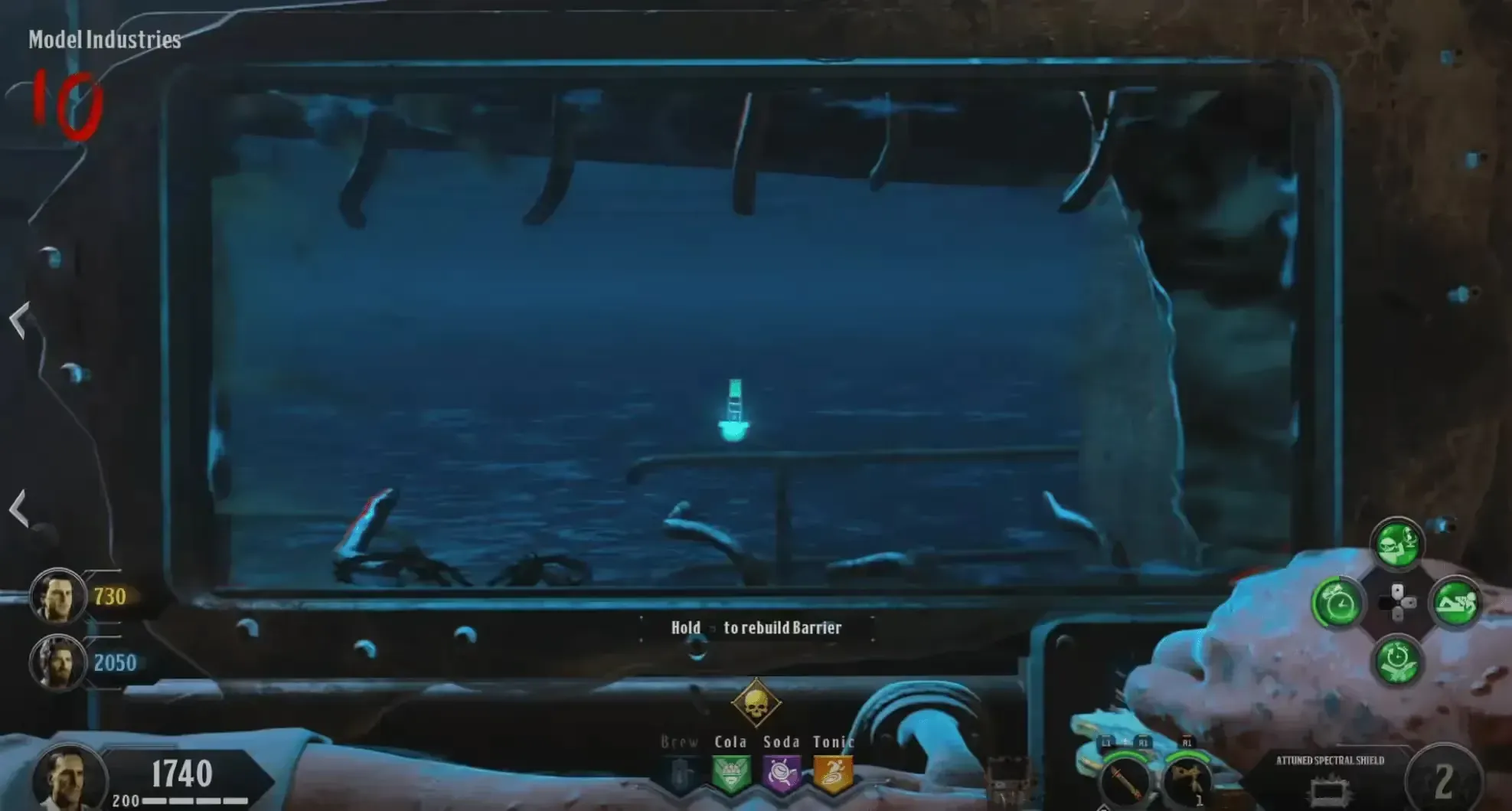 Look through the barrier toward the water.