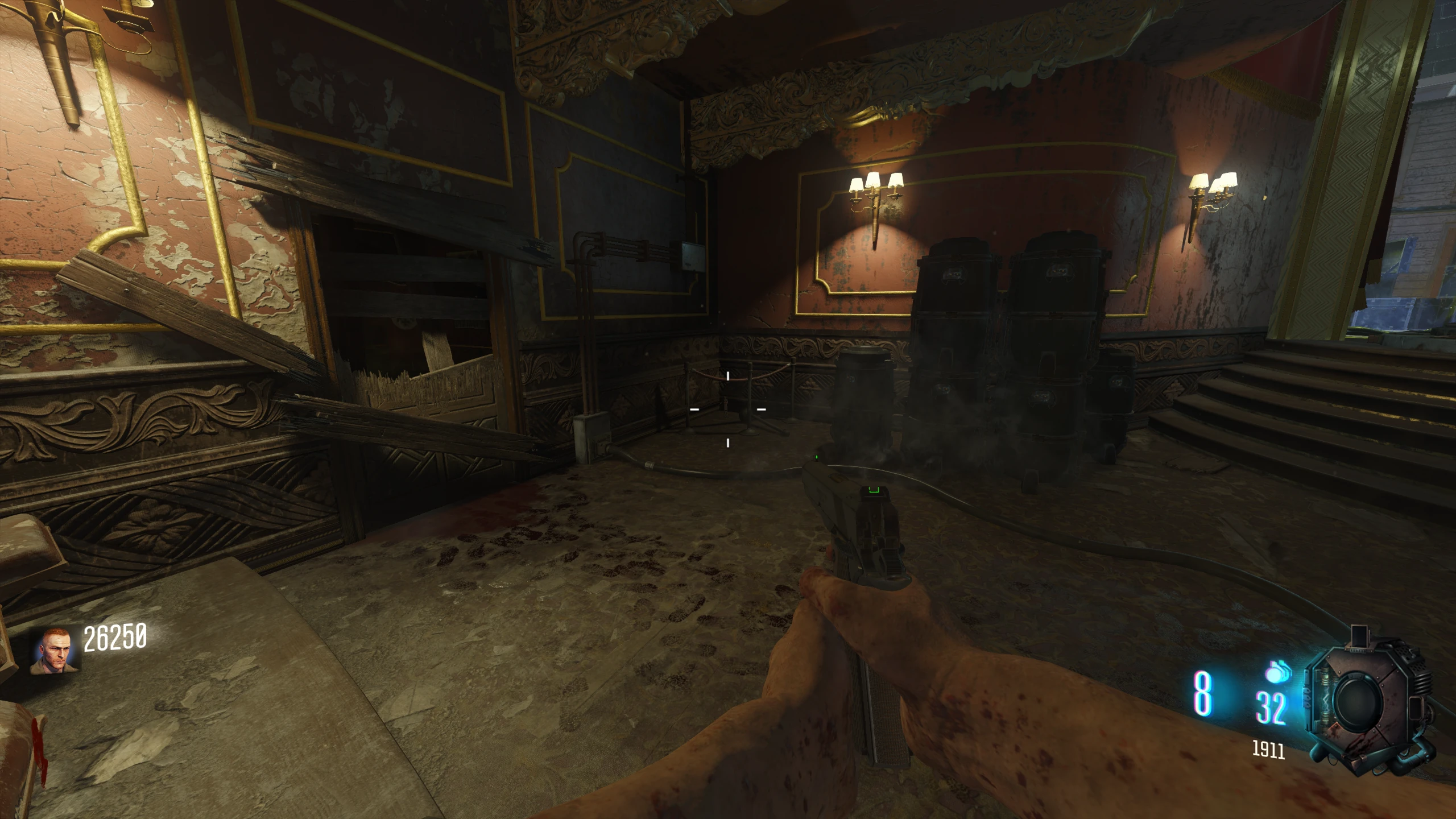 Theatre Area - Down the stairs from the teleporter, in front of some canisters