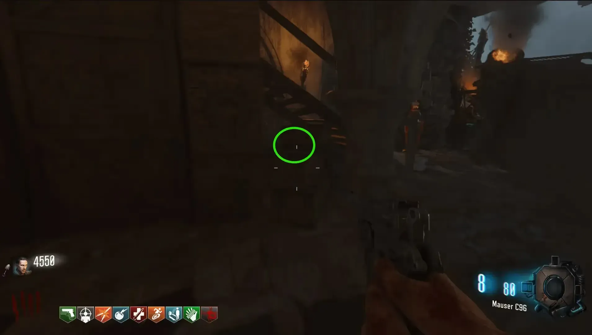 On some boxes between the Tank and the staircase