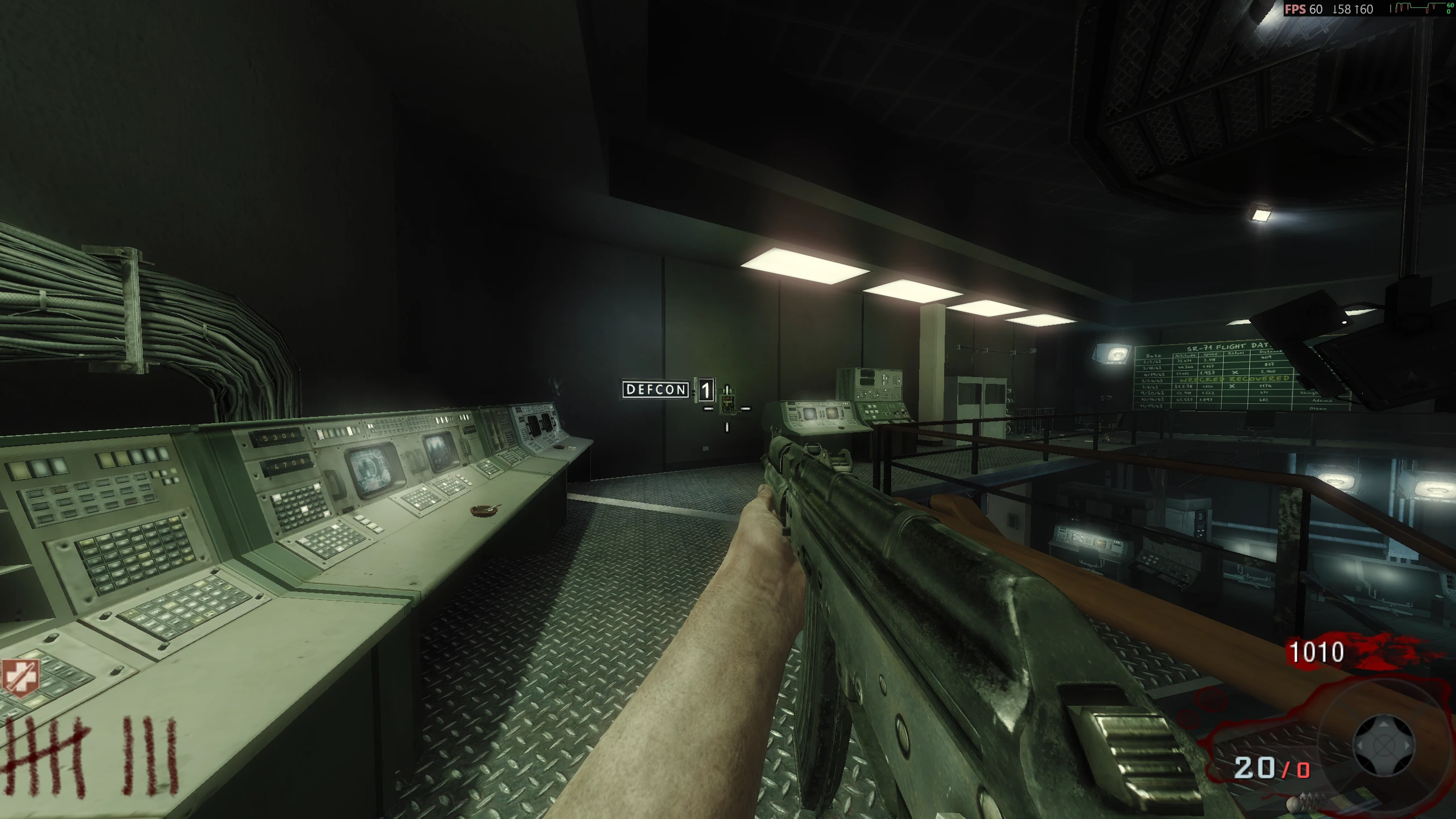 On the left when coming out of the first Elevator